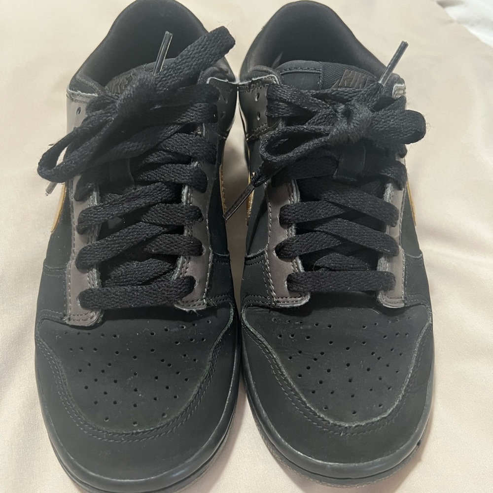 Nike Women's Black and Gold Dunk low